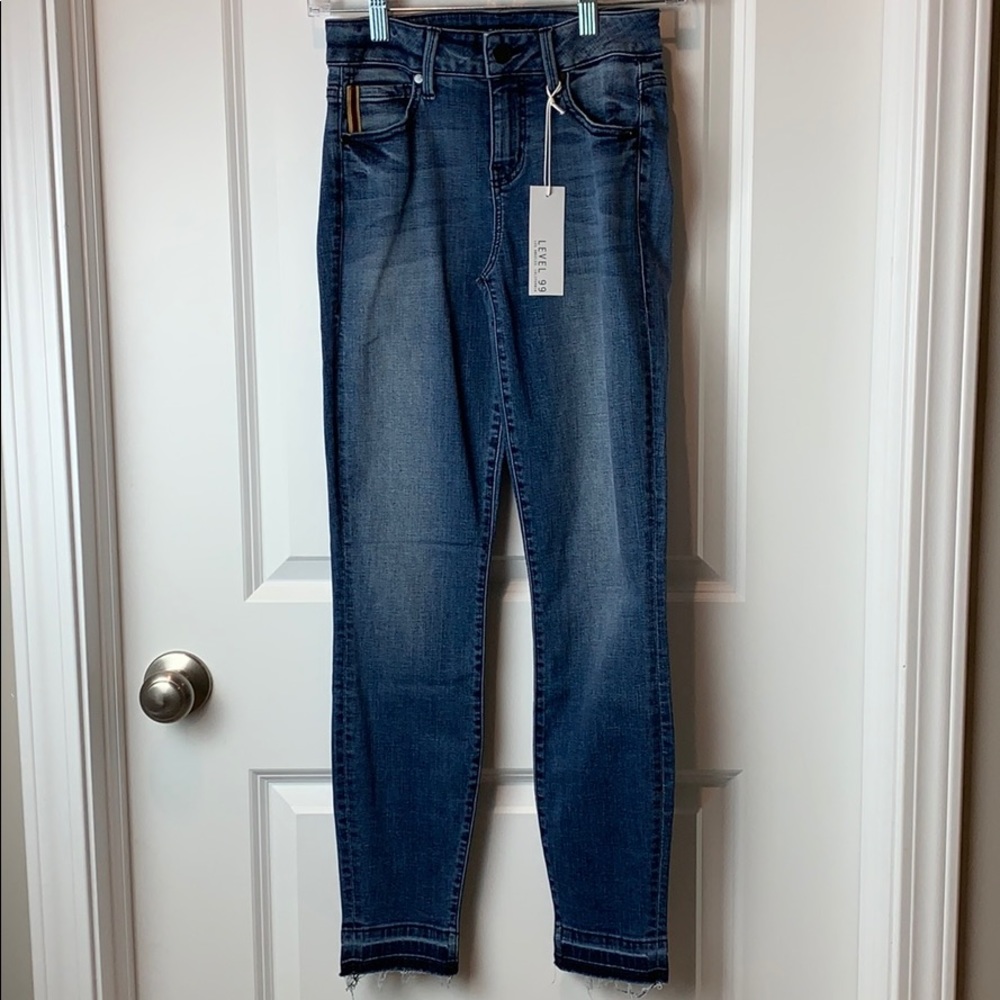 Midrise unraveled hem cropped skinny jeans